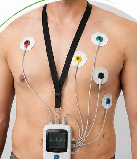 Patient wearing a compact 24-48 hour Holter monitoring device with chest electrodes in Surat